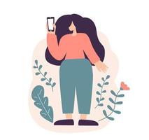 une jeune femme vectorielle en pull rouge utilise un smartphone, discute ou parle. une fille heureuse regarde au téléphone. illustration de dessin animé plat vecteur