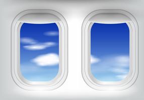 Fenêtre d'avion avec ciel bleu