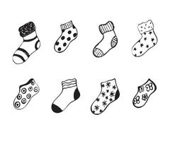 illustration de doodle noir et blanc de chaussettes chaudes vecteur