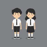 personnages mignons portant l'uniforme scolaire vecteur