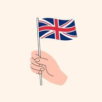 dessin animé main tenant le drapeau du royaume-uni, dessin vectoriel isolé.