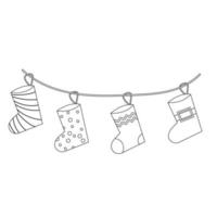 ensemble de chaussettes de noël pour les cadeaux sur une chaîne dans le style de ligne. illustration vectorielle vecteur