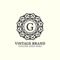 création de logo vectoriel luxueux mandala vintage lettre g