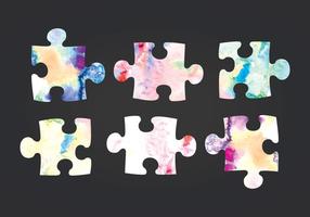Pièces de puzzle aquarellées vectorielles vecteur