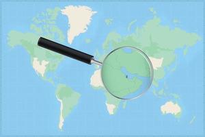 carte du monde avec une loupe sur une carte du qatar. vecteur