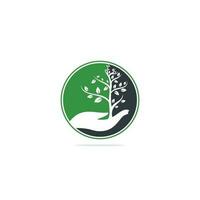 création de logo vectoriel arbre dans la main. logo de produits naturels. création de logo d'arbre à main