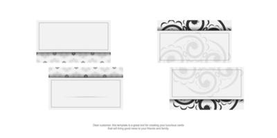 modèle de carte de visite de couleur blanche avec ornement de mandala noir vecteur