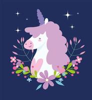 licorne fantastique avec des fleurs sur fond sombre vecteur