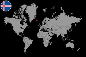 épinglez la carte avec le drapeau de l'islande sur la carte du monde. illustration vectorielle. vecteur