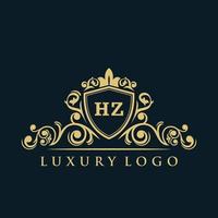 logo lettre hz avec bouclier d'or de luxe. modèle vectoriel de logo d'élégance.