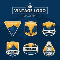 logo vintage de montagne bleue vecteur