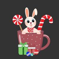 symbole de lapin de l'année dans une tasse avec des bonbons vecteur