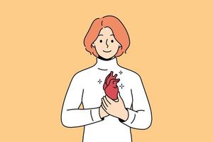 souriant jeune homme tenant le coeur dans les mains. une femme heureuse démontre un cœur sain. problème cardiovasculaire et soins de santé. illustration vectorielle. vecteur