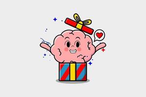 cerveau de dessin animé mignon sortant d'une grande boîte cadeau vecteur