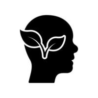 plante dans l'icône de silhouette de tête humaine. pictogramme de glyphe de concept d'environnement de cerveau de feuille et de personne. idée d'écologie de branche d'arbre, icône de pensée écologique. symbole de l'esprit de la nature verte. illustration vectorielle isolée. vecteur