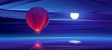 montgolfière volant au-dessus de l'eau de mer dans le ciel nocturne vecteur