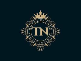 lettre tn logo victorien de luxe royal antique avec cadre ornemental. vecteur
