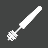 icône inversée de glyphe de brosse de mascara vecteur