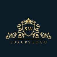 logo lettre xw avec bouclier d'or de luxe. modèle vectoriel de logo d'élégance.