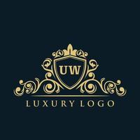 logo lettre uw avec bouclier d'or de luxe. modèle vectoriel de logo d'élégance.