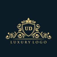 logo lettre ud avec bouclier d'or de luxe. modèle vectoriel de logo d'élégance.