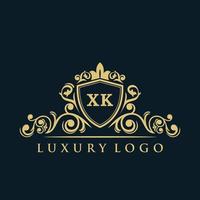 logo lettre xk avec bouclier d'or de luxe. modèle vectoriel de logo d'élégance.