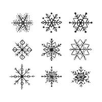 collection de flocons de neige dessinés à la main isolés sur fond blanc. icône de griffonnage de flocon de neige vecteur