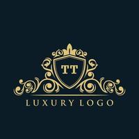 logo lettre tt avec bouclier d'or de luxe. modèle vectoriel de logo d'élégance.