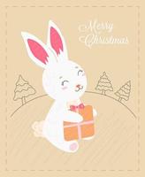 carte de noël lapin mignon tenant un cadeau sur le fond de la forêt vecteur