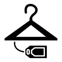 icône de glyphe de vente de cintre vecteur