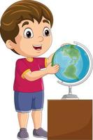 dessin animé mignon petit garçon avec globe vecteur