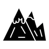 icône de glyphe de montagne enneigée vecteur