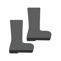 icône plate en niveaux de gris de bottes vecteur
