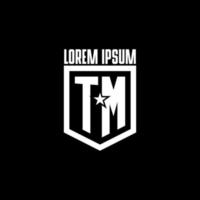 logo de jeu initial tm avec design de style bouclier et étoile vecteur