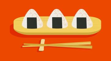 trois boules d'onigiri sur planche de bois et illustration vectorielle de baguettes vecteur