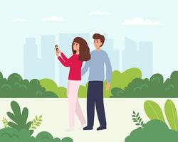 un couple heureux prend un selfie. l'homme et la femme sont photographiés ensemble. illustration vectorielle dans un style plat vecteur