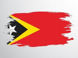 drapeau du timor oriental peint avec un pinceau vecteur