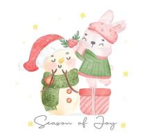 mignon joyeux noël lapin lapin avec bonhomme de neige ami dessin animé aquarelle main peinture illustration vecteur idée pour carte de voeux