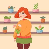 une jolie fille rousse dans un pull orange et une jupe verte tient des fleurs dans ses mains et se tient à côté des étagères sur lesquelles se trouvent des plantes d'intérieur dans des pots dessinés dans un style cartoon vecteur