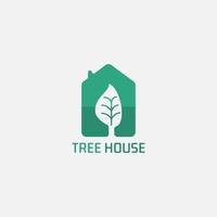 logo de maison verte avec espace négatif d'arbre. vecteur