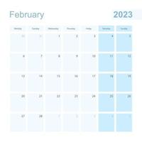Planificateur mural de février 2023 de couleur pastel bleu, la semaine commence le lundi. vecteur