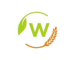 logo de l'agriculture sur le concept de lettre w. création de logo d'agriculture et d'élevage. agro-industrie, éco-ferme et conception de campagne rurale vecteur