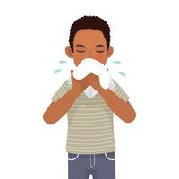 jeune homme africain au nez qui coule tenant un mouchoir ou un tissu éternuant et soufflant à cause de la fièvre, du rhume, de la grippe, de l'allergie, de l'infection virale vecteur