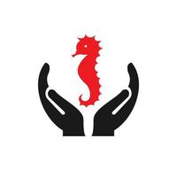 création de logo hippocampe à la main. logo de cheval de mer avec vecteur de concept de main. création de logo main et hippocampe
