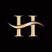 lettre h logo doré luxueux symbole monogramme conception vecteur