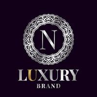 lettre n création de logo vectoriel cercle initial de luxe