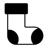 icône de glyphe de chaussettes de noël isolé sur fond blanc design moderne vecteur