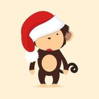 singe mignon avec bonnet de Noel vecteur