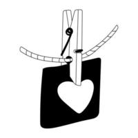 note d'amour décorée de coeur avec une pince à linge sur une corde. décoration de la saint valentin. illustration vectorielle doodle pour la conception d'affiches et de cartes de voeux isolée sur blanc. contour noir. vecteur