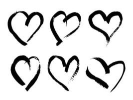 coeurs de pinceau dessinés à la main. ensemble de six coeurs de doodle noir grunge sur fond blanc. symbole de l'amour romantique. illustration vectorielle. vecteur